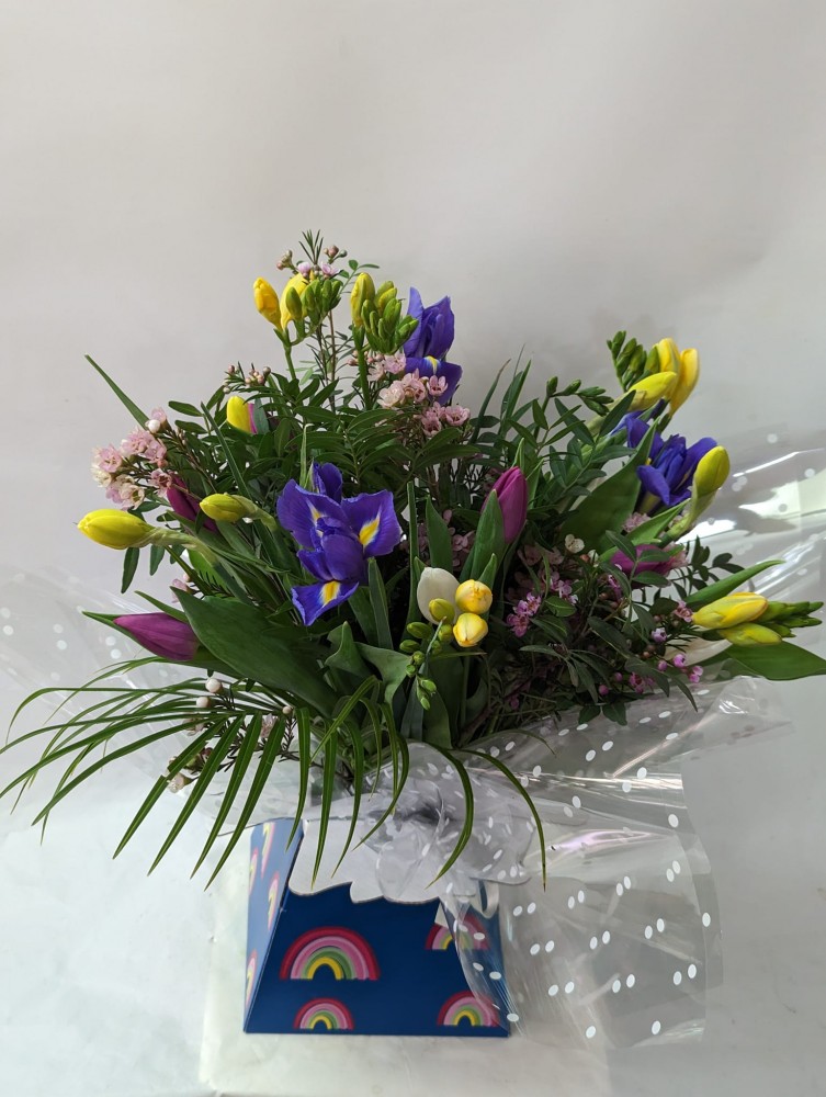 mixed spring flowers includes freesia