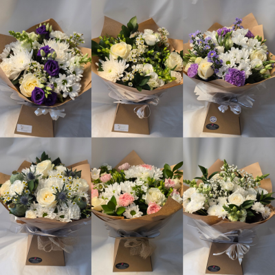 The sympathy aqua - Bouquets in water but in colours and flowers suitable to send sympathy at the saddest of times the bouquet in water is a good option as at this time they can sometimes run out of vases.