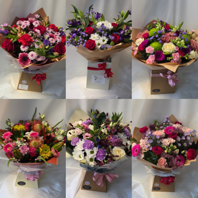 Deluxe florist choice aqua - larger more choice varieties which varies on size, this is not really an option to pick just examples of ones previously made but can add any preferences but please understand we can't keep all flowers in stock so if short notice ie same or next day will be what we have in stock can also state no lilies etc