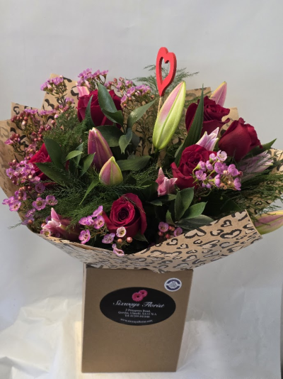 6 red roses with 3 pink lilies - red roses, pink lilies waxflower and foliage aqua packed