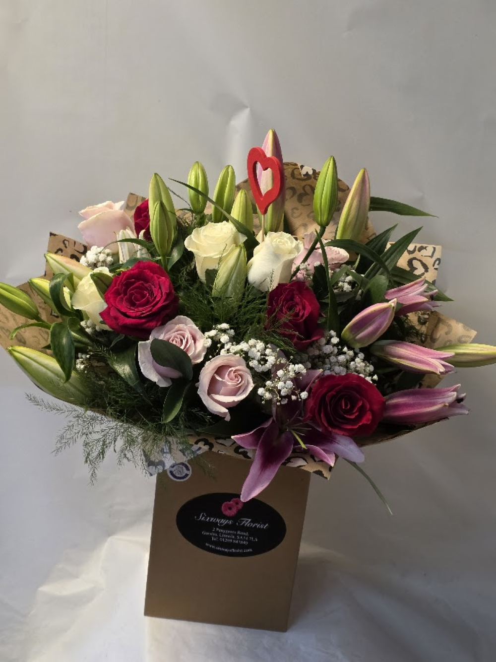 12 mixed roses with 6 mixed lilies
