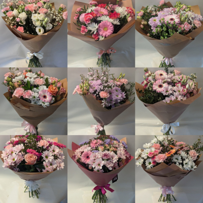 Pink bouquet - mixed bouquet with pink being the main colour n.b may contain different shades of pink or with white possibly lilac or peach/coral but pink is the predominate colour