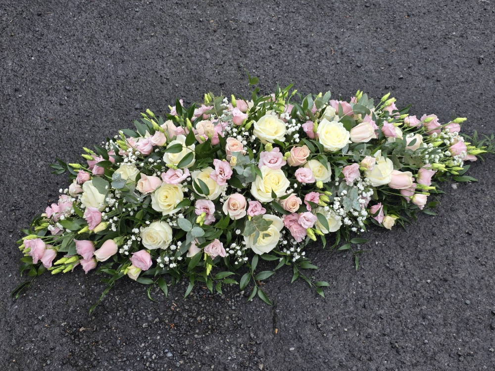 soft pink and cream roses and lisianthus spray