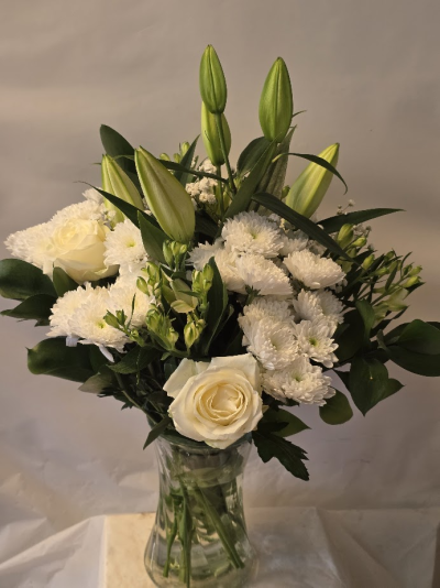sympathy vase - neutral mix of flowers in a vase for ease for the recipients