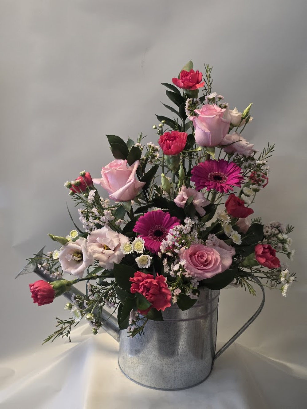 shades of pink watering can