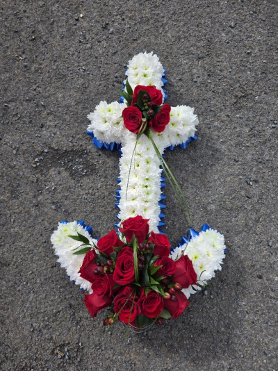 Anchor tribute - The 'Anchor Tribute' from Six Ways Florist, Llanelli, showcases a striking blend of vibrant reds and calming whites. Perfect for heartfelt goodbye, beautifully handcrafted.