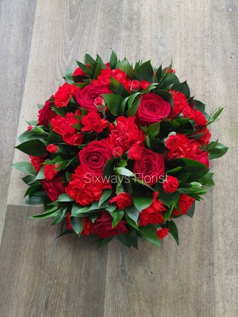 Red funeral posy