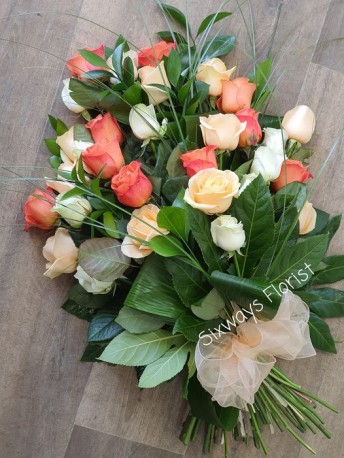 Peach, orange and cream roses
