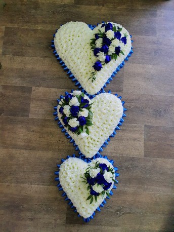blue and white trio of hearts