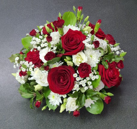 red and white funeral posy
